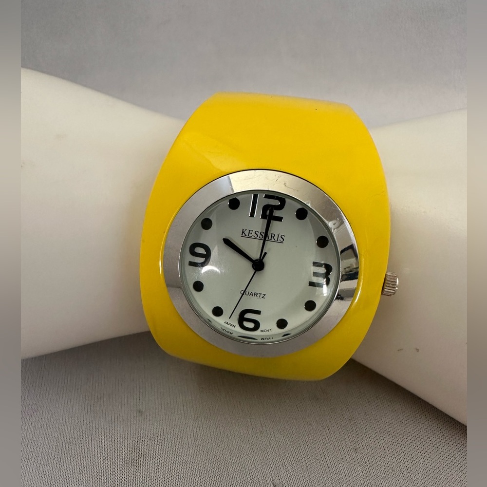 Kessaris yellow enameled metal clamper watch